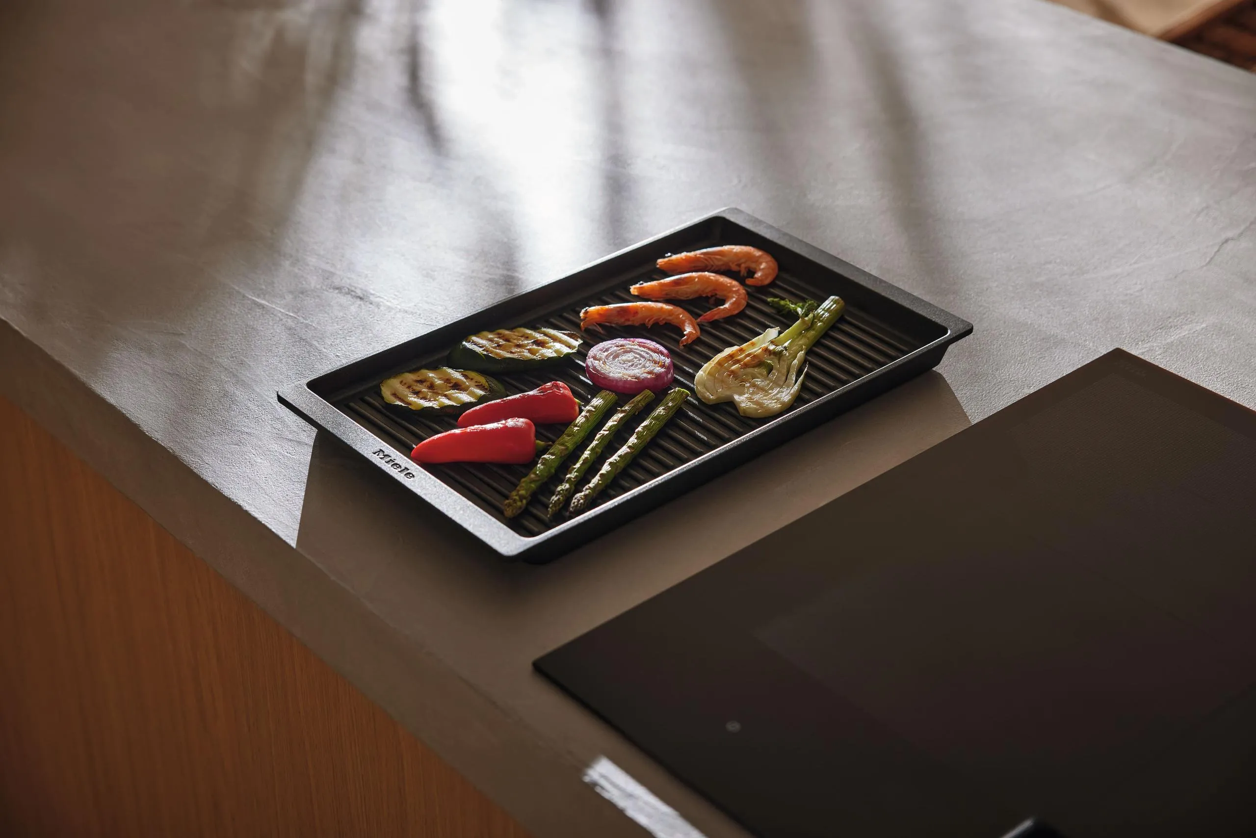 Miele GGRP Gourmet Griddle Plate - For A Unique Grill Experience On Miele Induction Cooktops.